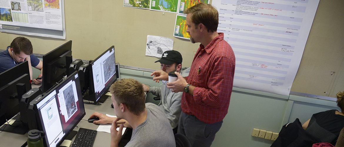 Students and professor in a GIS Lab