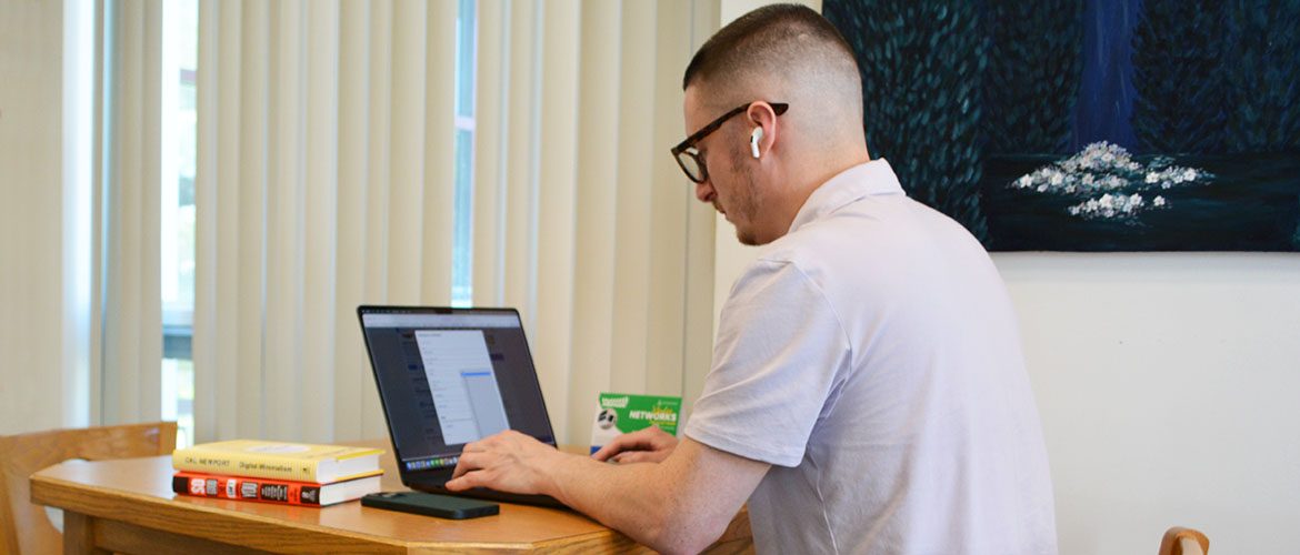 Student working on a laptop