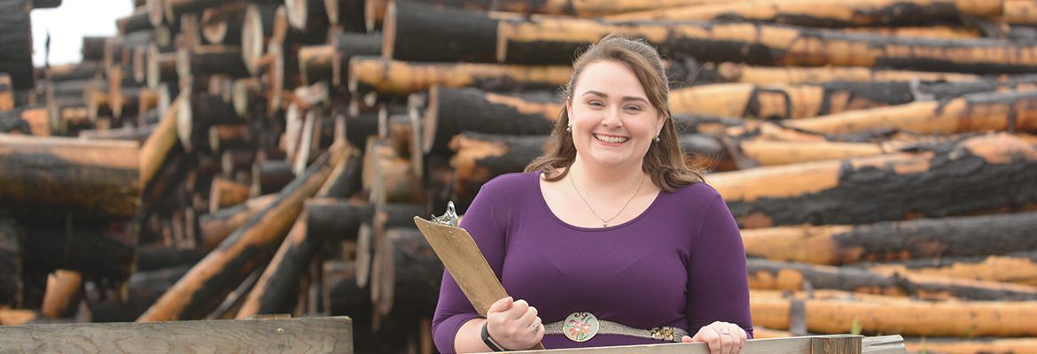 Student interning at lumber company