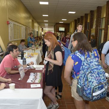 UMF students explore employment and internship opportunities during one of the university's yearly career fairs.