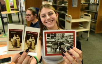 During her Summer Experience, new Farmington student enjoys seeing pictures from back in the day and being a part of a long history of UMFers.