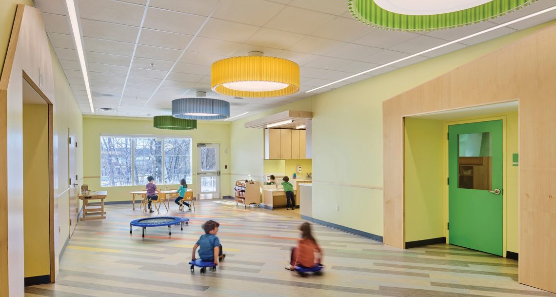 The center’s design features spaces that create a child-scaled learning environment connected by a broad, sunny multipurpose space.