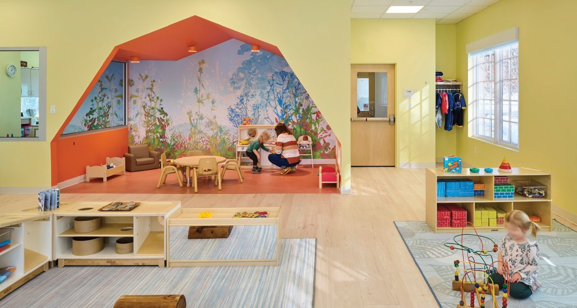 Each age-specific primary classroom is represented by an iconic residential form - gable, gambrel, sloped roof or curved roof - that create welcoming entries to each classroom and are echoed inside each room as scaled down niches for imaginative play and gathering.